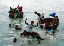 Naught boys playing water